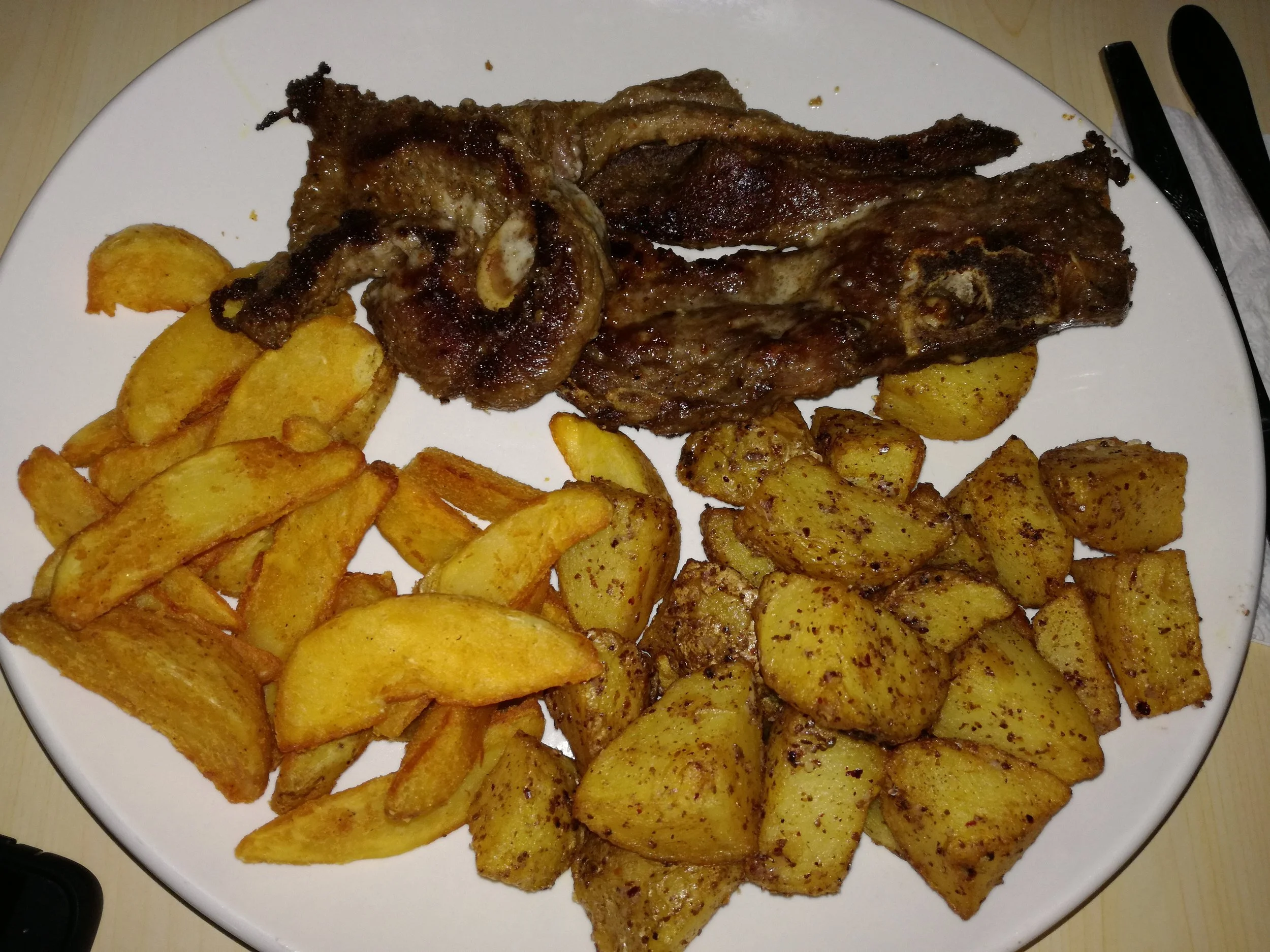 Garlic potatoes, wedges, and lamb
