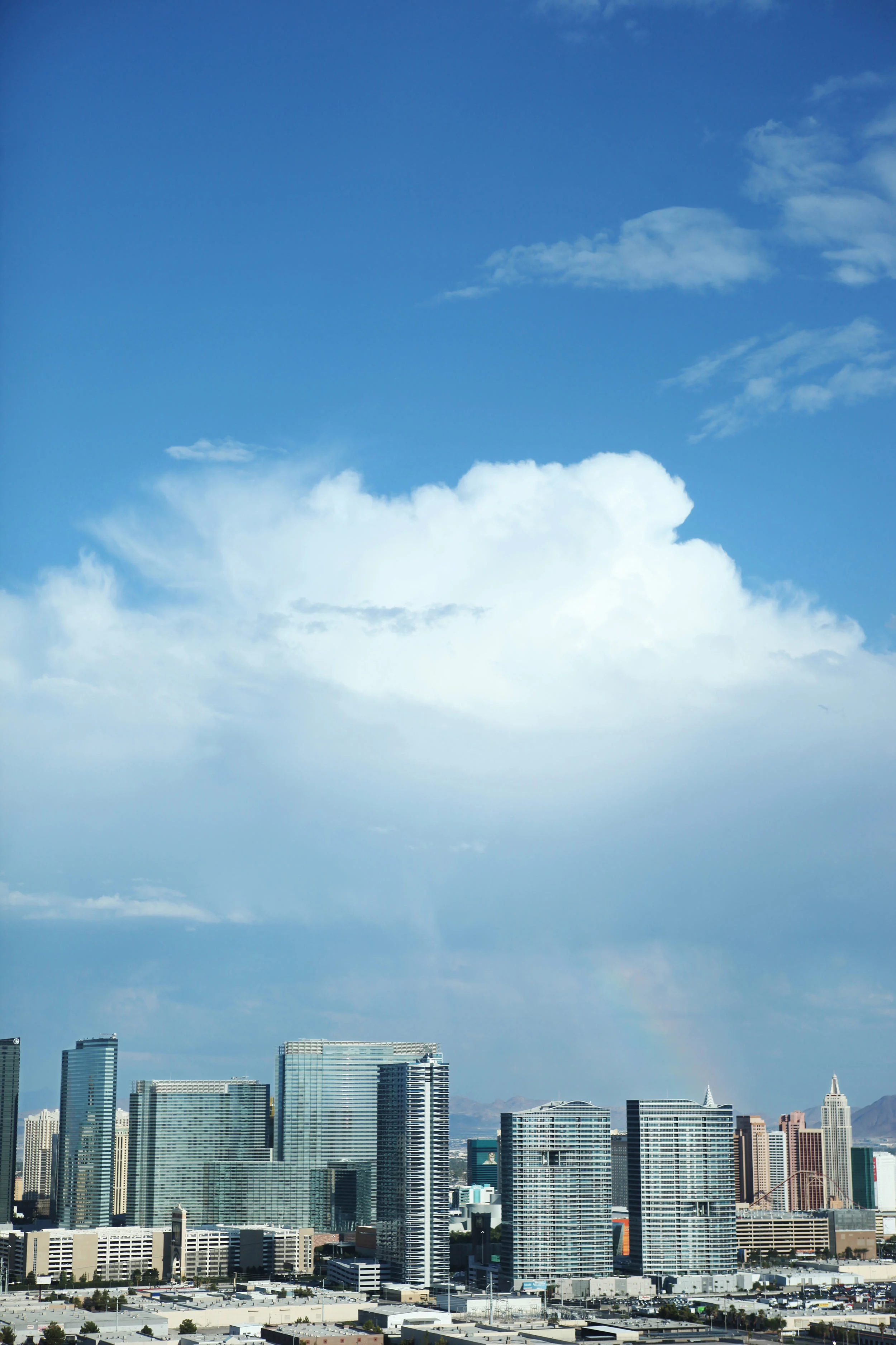 Las Vegas skyline on a sunny day with blue sky and clouds