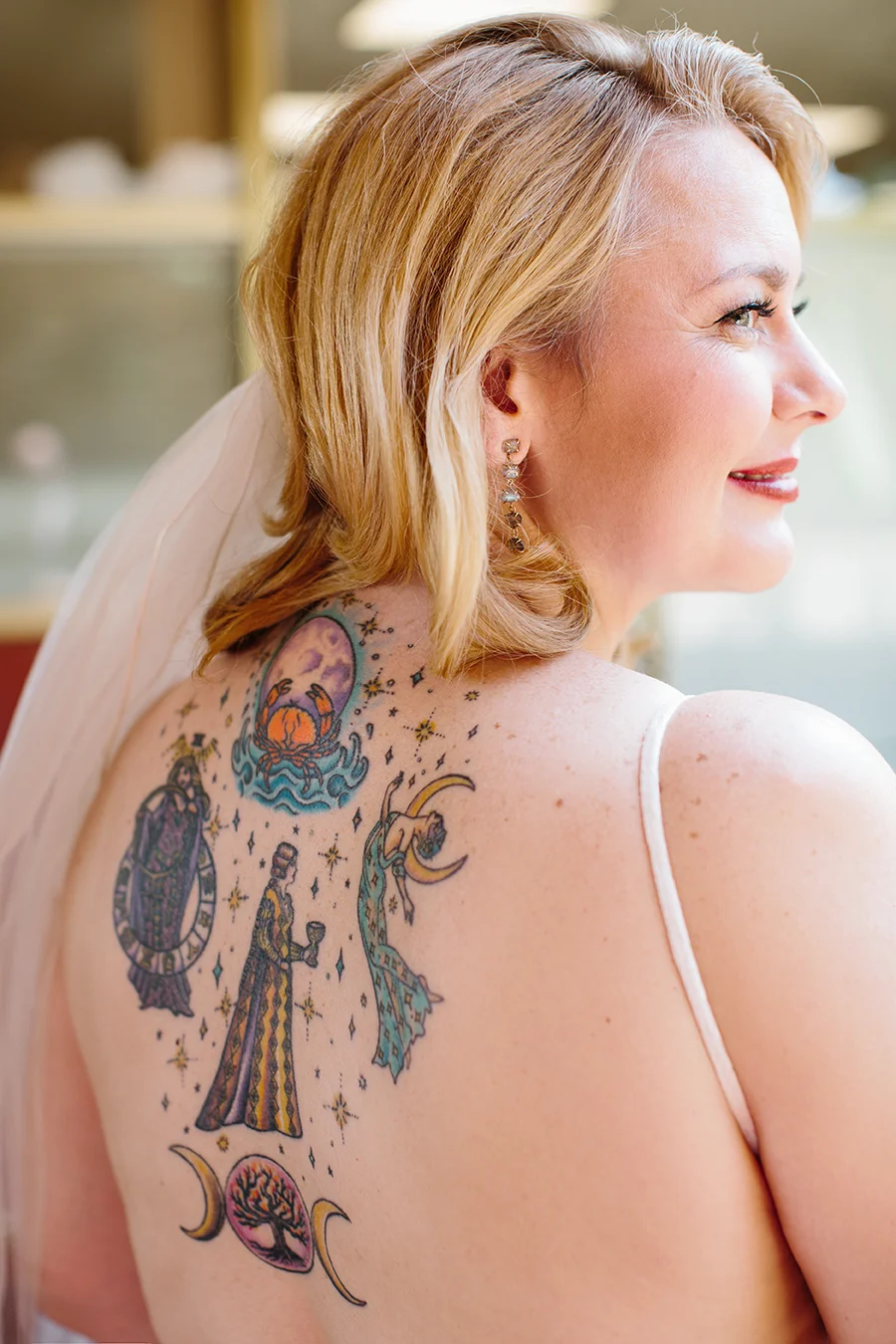 The bride’s tattoo from an artist in London, where she met Nick.