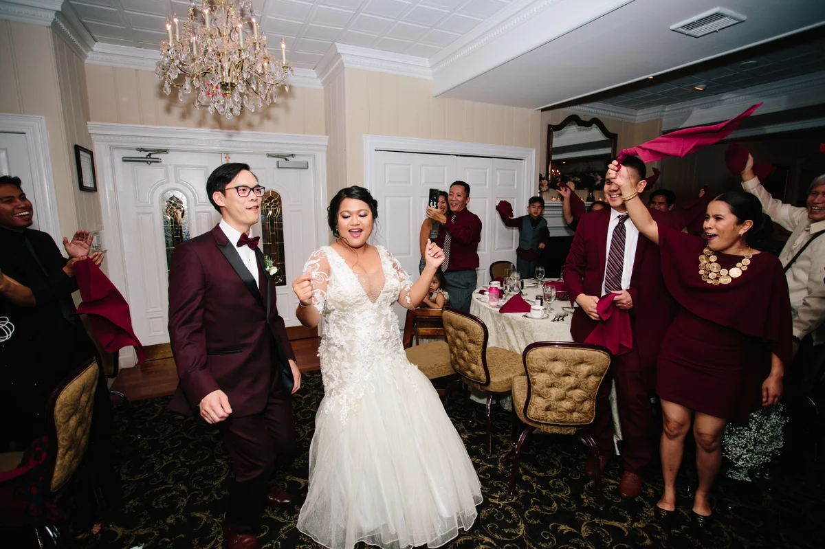 The bride and groom’s entrance to their wedding reception at Washington Crossing Inn.