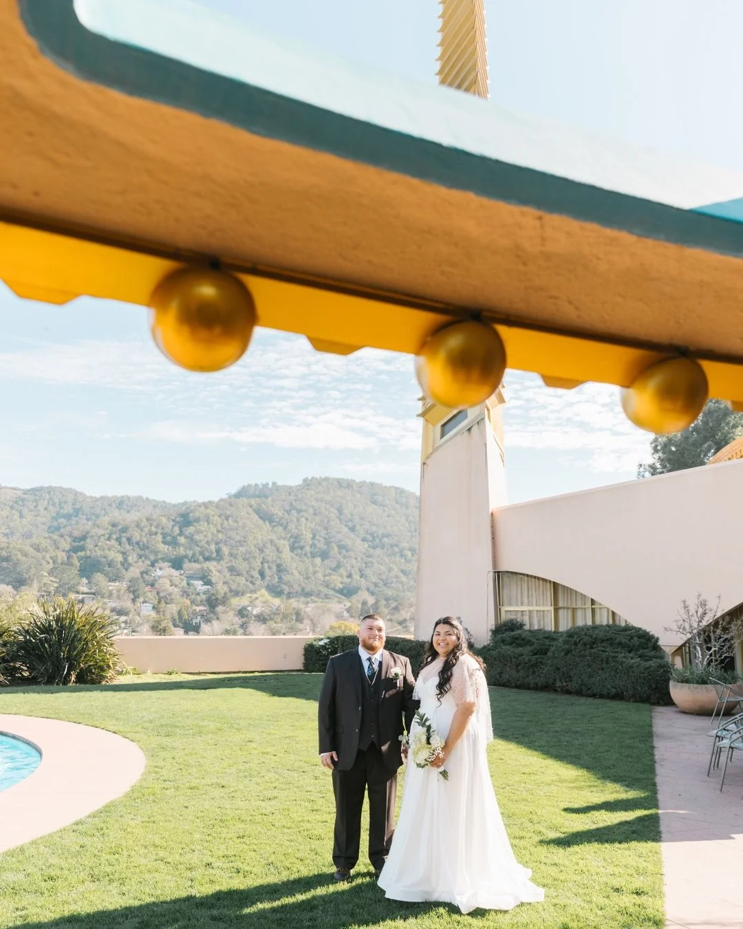 These two were married on a sunny January morning at the Marin County Civic Center. The light inside was soft and ethereal. ☀️

They met in high school but didn&rsquo;t begin dating until years later. The bride carried her bouquet with a small photo 