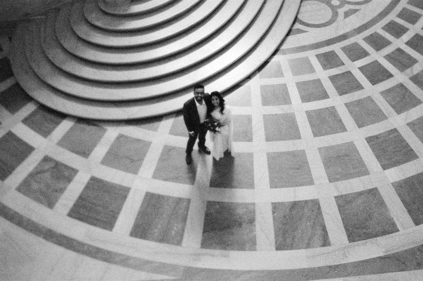 Somewhere at San Francisco&rsquo;s Iconic City Hall there&rsquo;s a security camera with footage of me hanging over a railing to get that first shot. Worth it!

.
.
.
.
.
.
#sanfranciscoweddingphotographer #bayareawedding #film