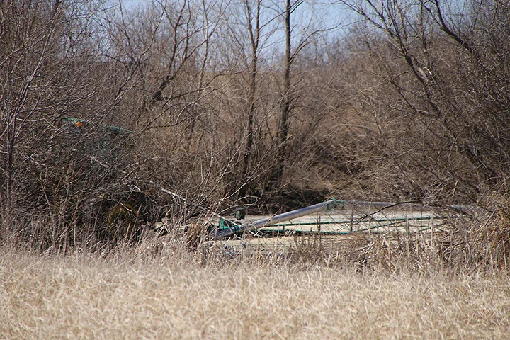 A close-up shows some kind of effort to cover up the spill of December.