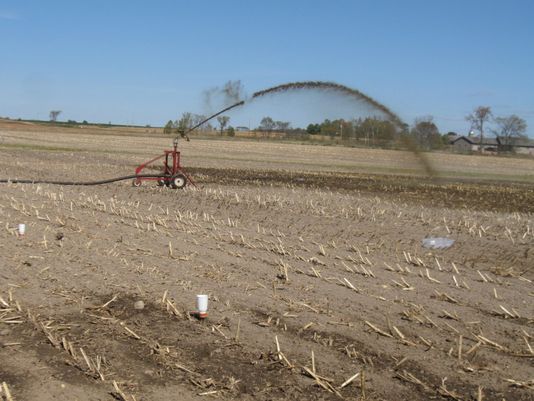 Manure is being applied via an irrigation system using a traveling gun and reel.(Photo: Courtesy Wisconsin Manure Irrigation Work, Wisconsin State Farmer Wisconsin Manure Irrigation Work)