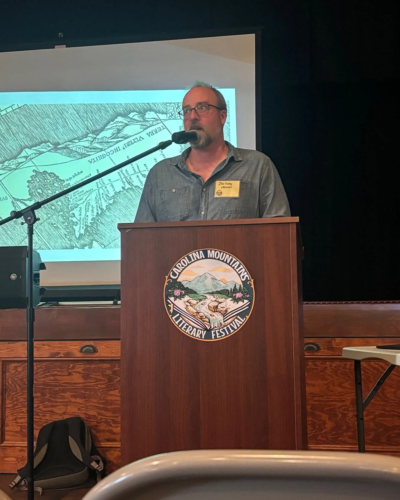 Listening to the hilarious scholar and teacher @zackvernon33 at @cmlitfest! #ethicalfood in #appalachia He is discussing Eating on a Mountain at the End of the World and making us hoot with laughter.