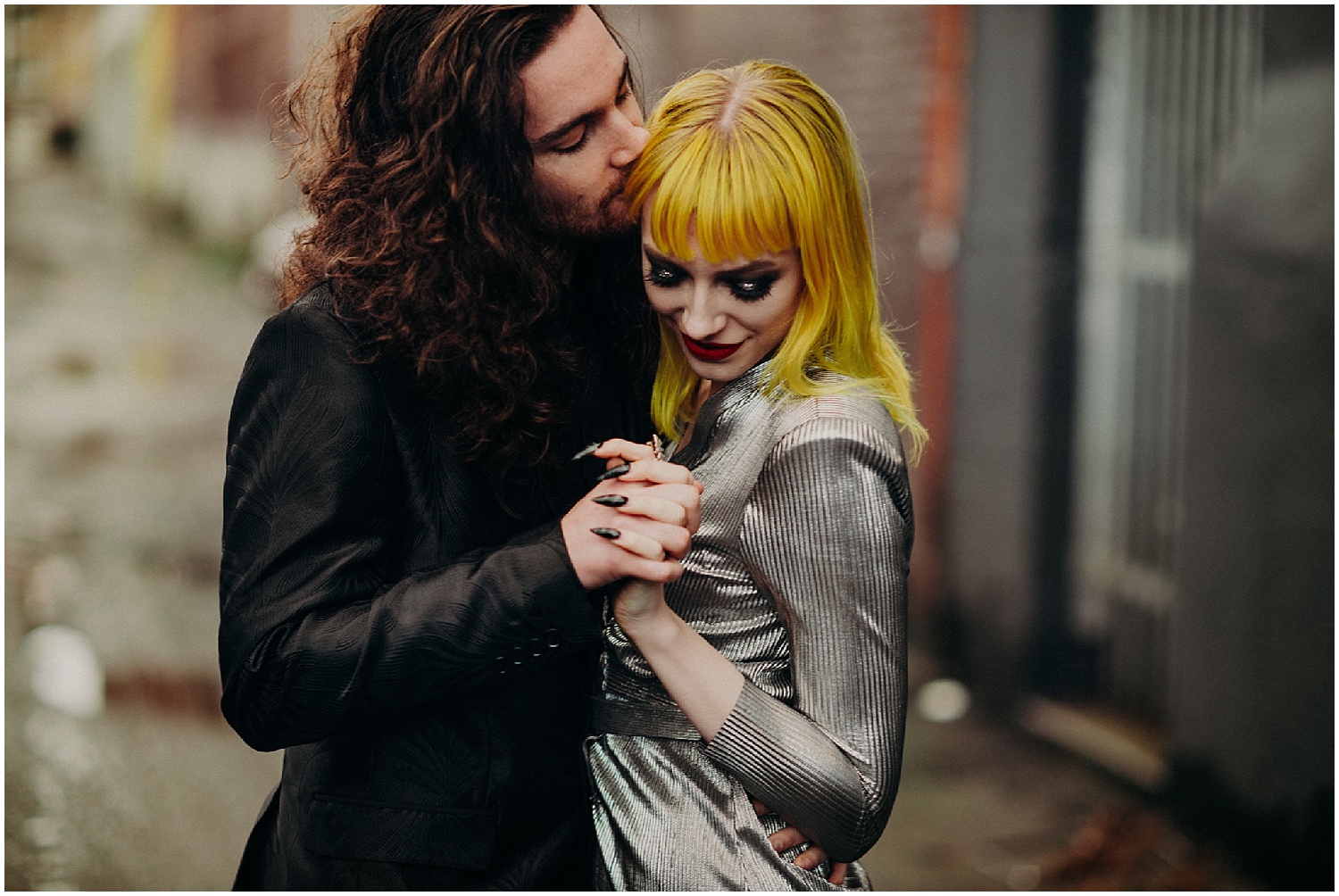  Vancouver love engagement couples session photography Urban Yellow hair blunt bangs centre part fingernails manicure curly long hair glamour makeup red lips lipstick metallic dress retro modern 