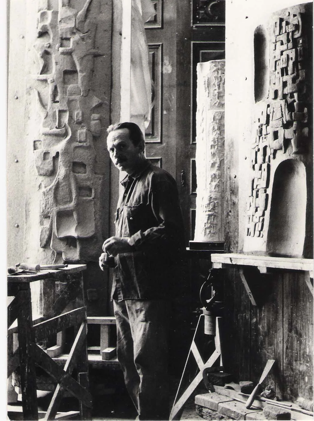 Alfieri standing with his artwork