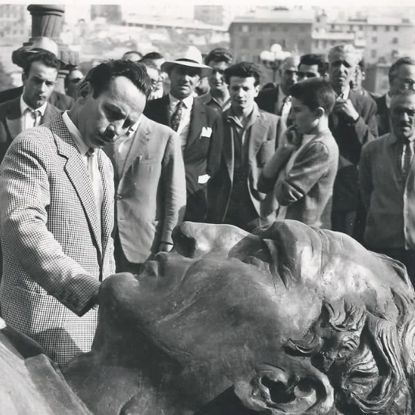 Alfieri touching his sculpture of Christopher Columbus