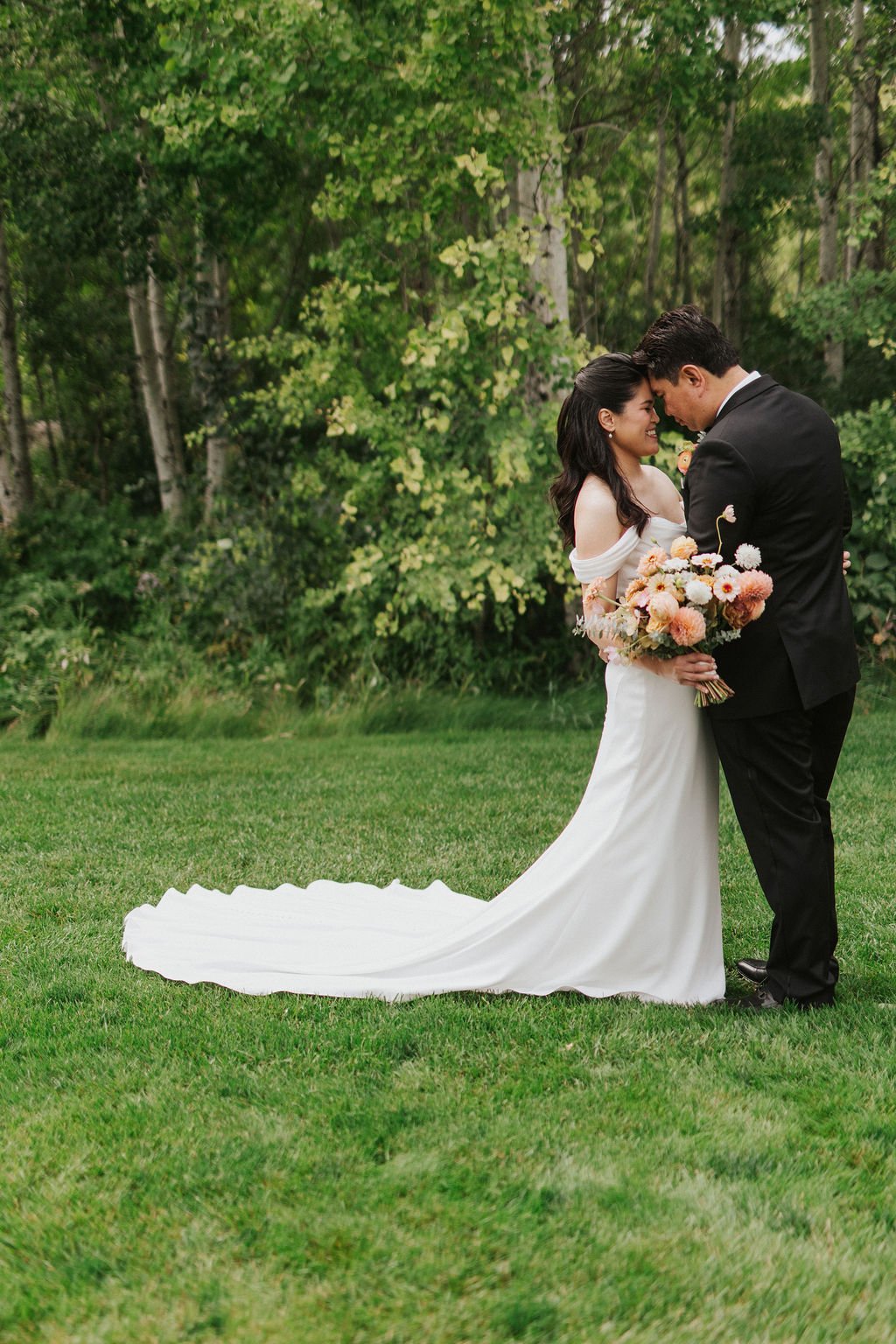 Filipino wedding couple with late summer bridal bouquet