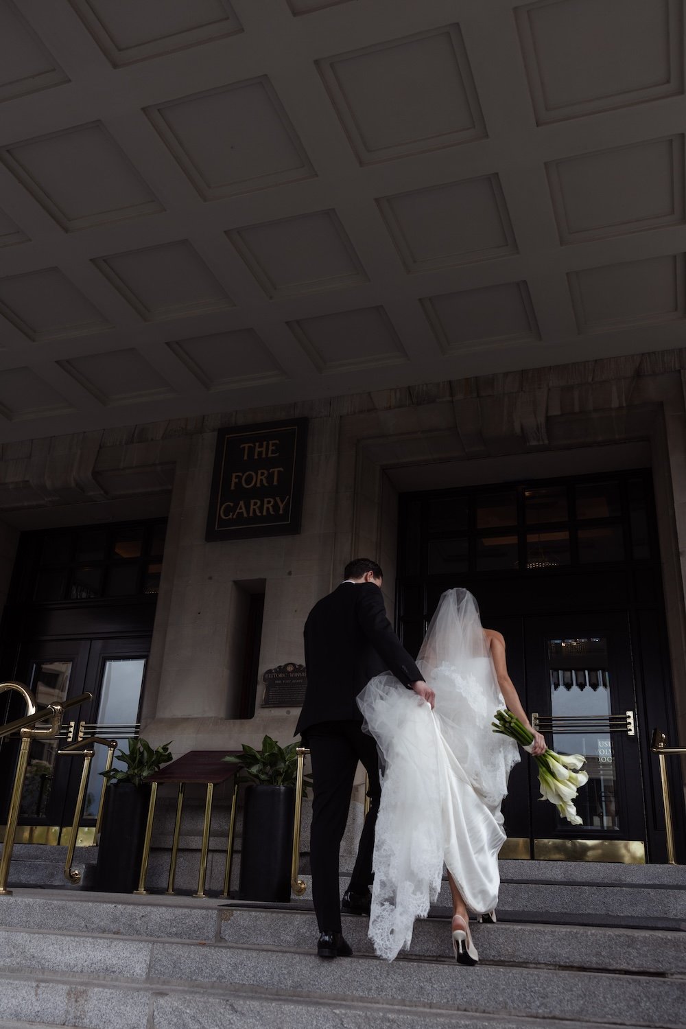 Wedding Couple walking into the Fort Garry Hotel Winnipeg
