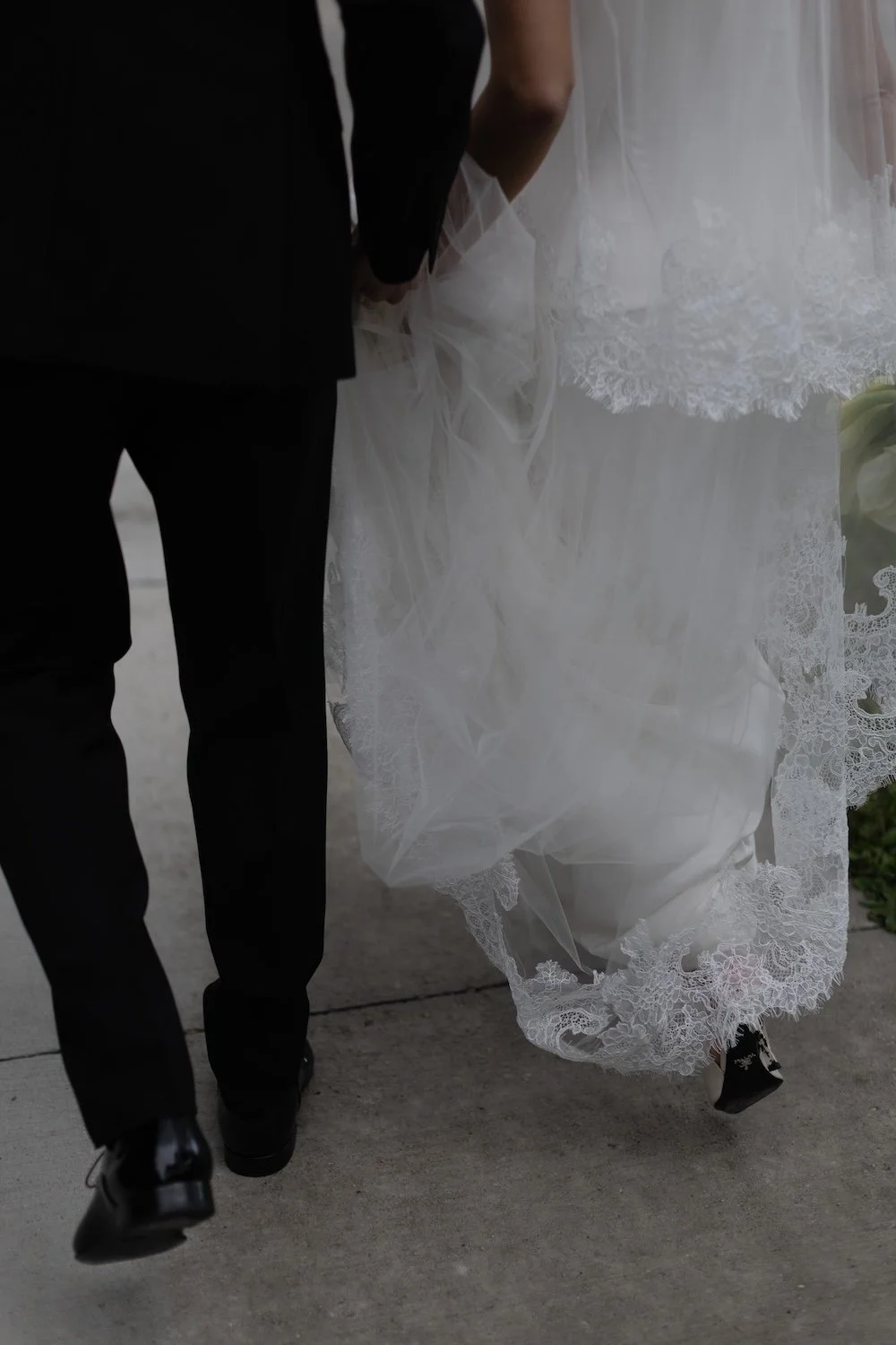 Chic Wedding Portrait of bridal gown lace hem