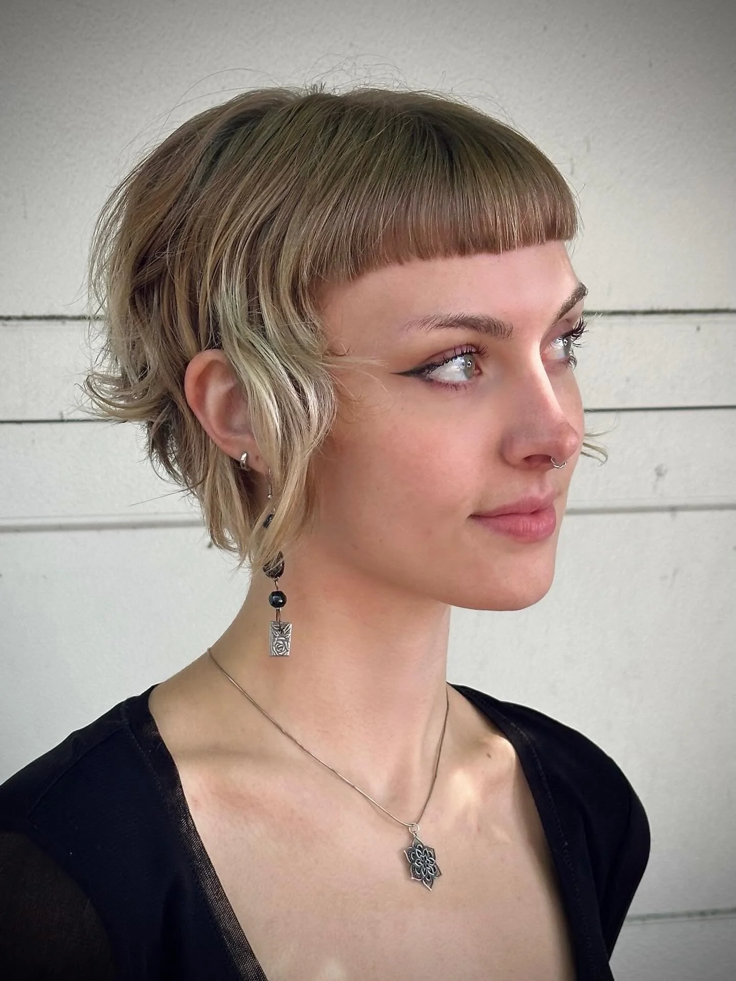 Short + sweet with a bit of edge 🖤 textured bob and micro fringe moment ⚔️ @feryn.fischer.hair &bull;&bull;&bull; styled using @backofbottle GRIP + GRACE texturizing spray 
&bull;
&bull;
&bull;
#PDX #PDXHair #PDXHairSalon #PDXHairstylist #Portland #