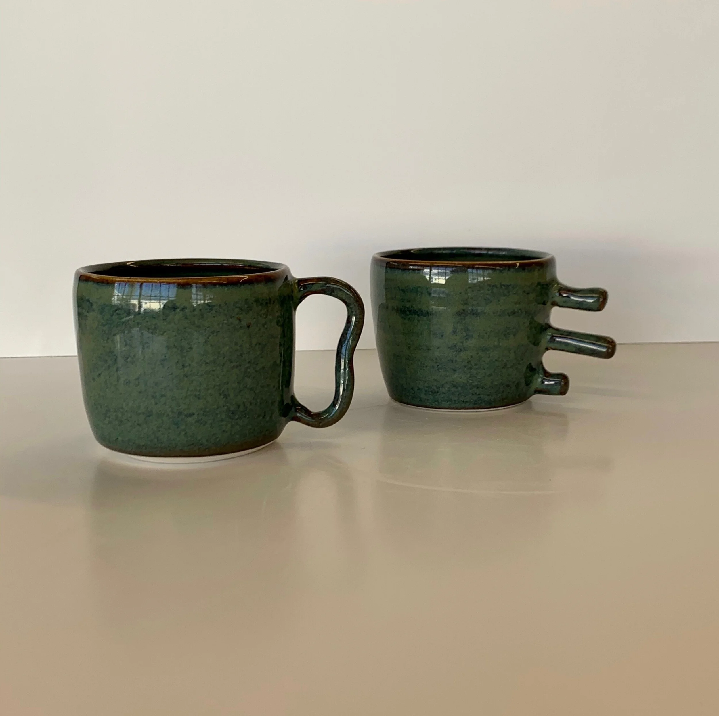 Funky mugs - floating blue over porcelain