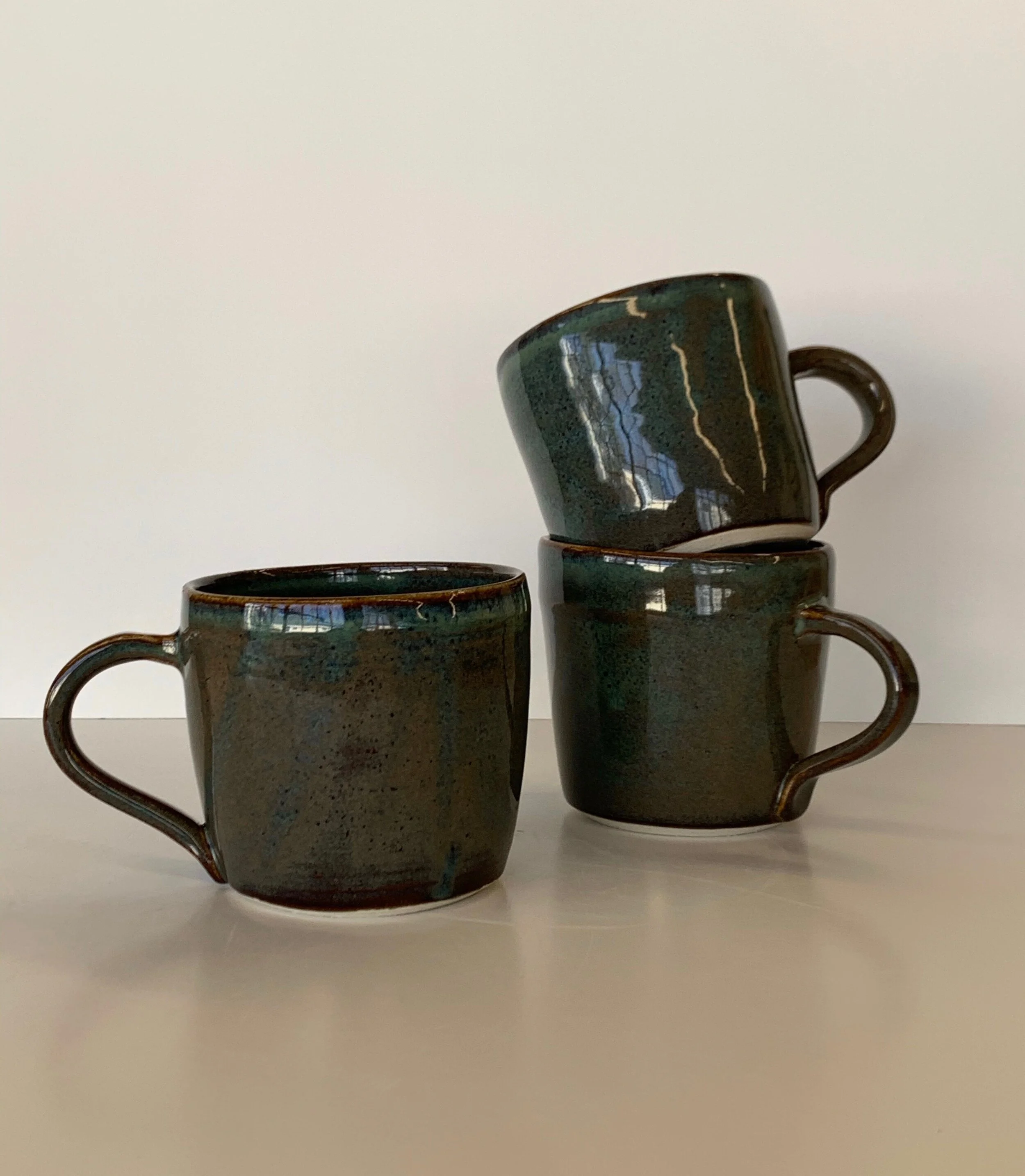 Floating blue coffee mugs