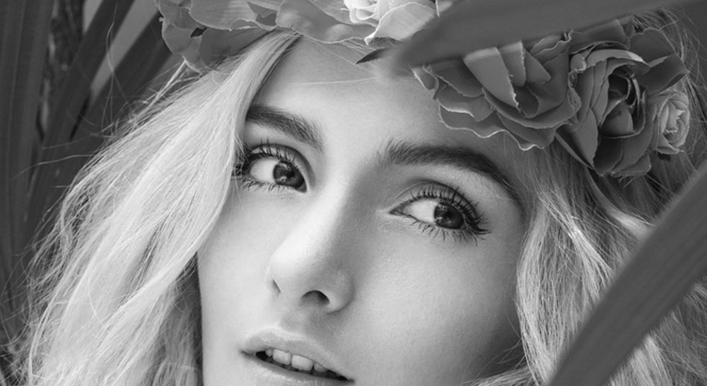 menu-header-eyebrow-model-flowers-on-head.jpg