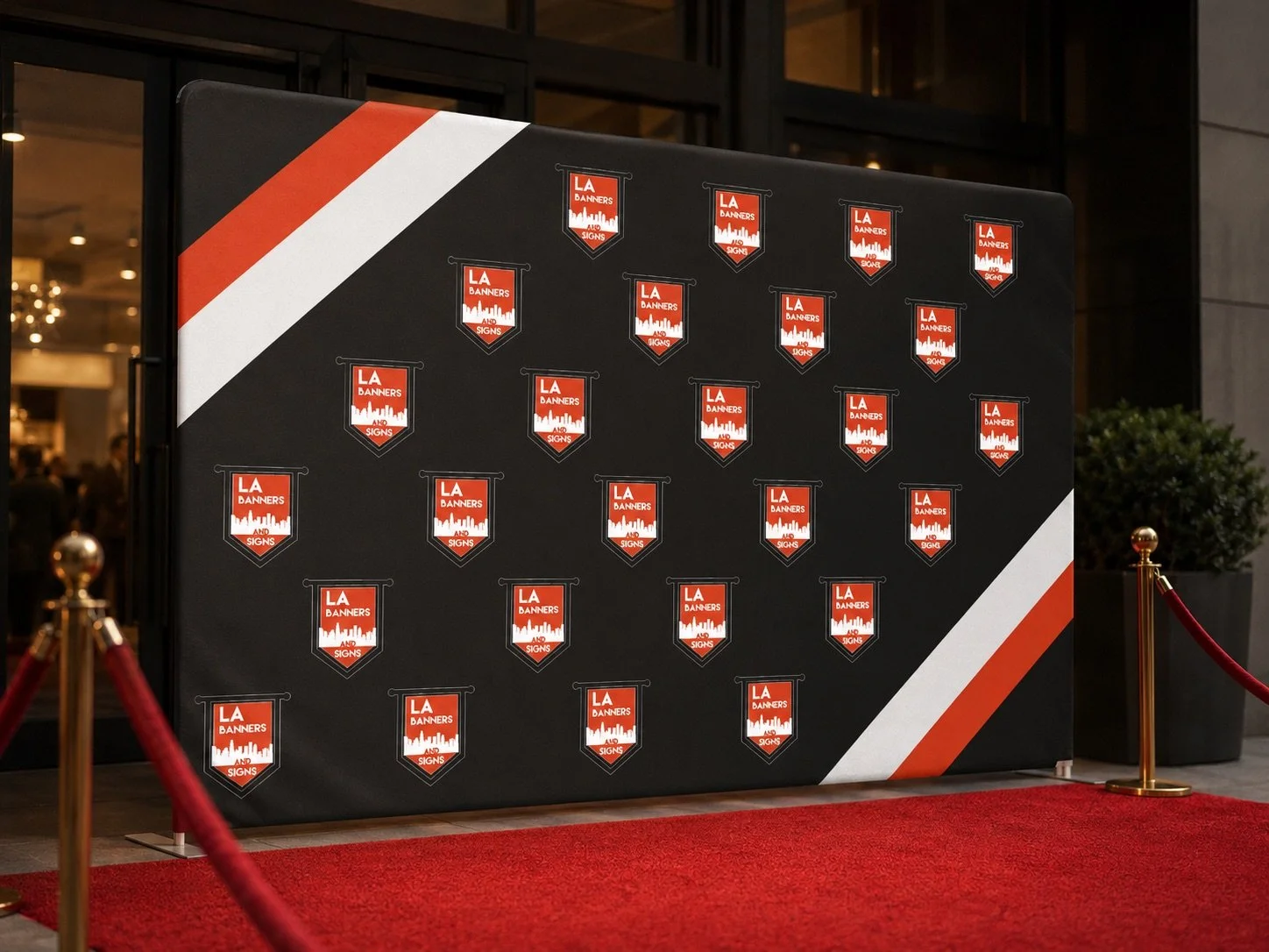 Step-and-repeat event backdrop with branded pattern