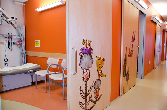 Orange color coded patient hallway with exam rooms