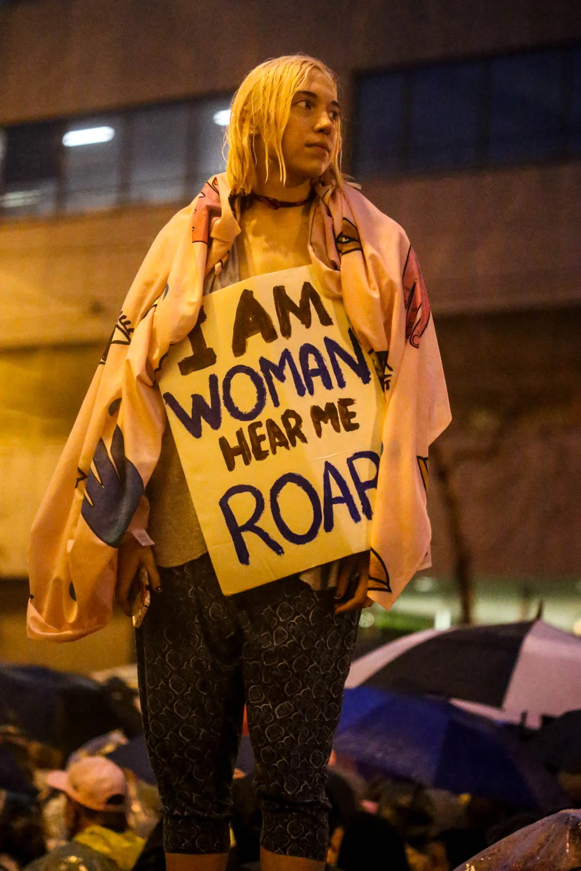  Gretchen Ackerman rises above the crowd to view the Women's March in San Francisco, Cali on Saturday, January 21, 2017. (Jessica Webb) 