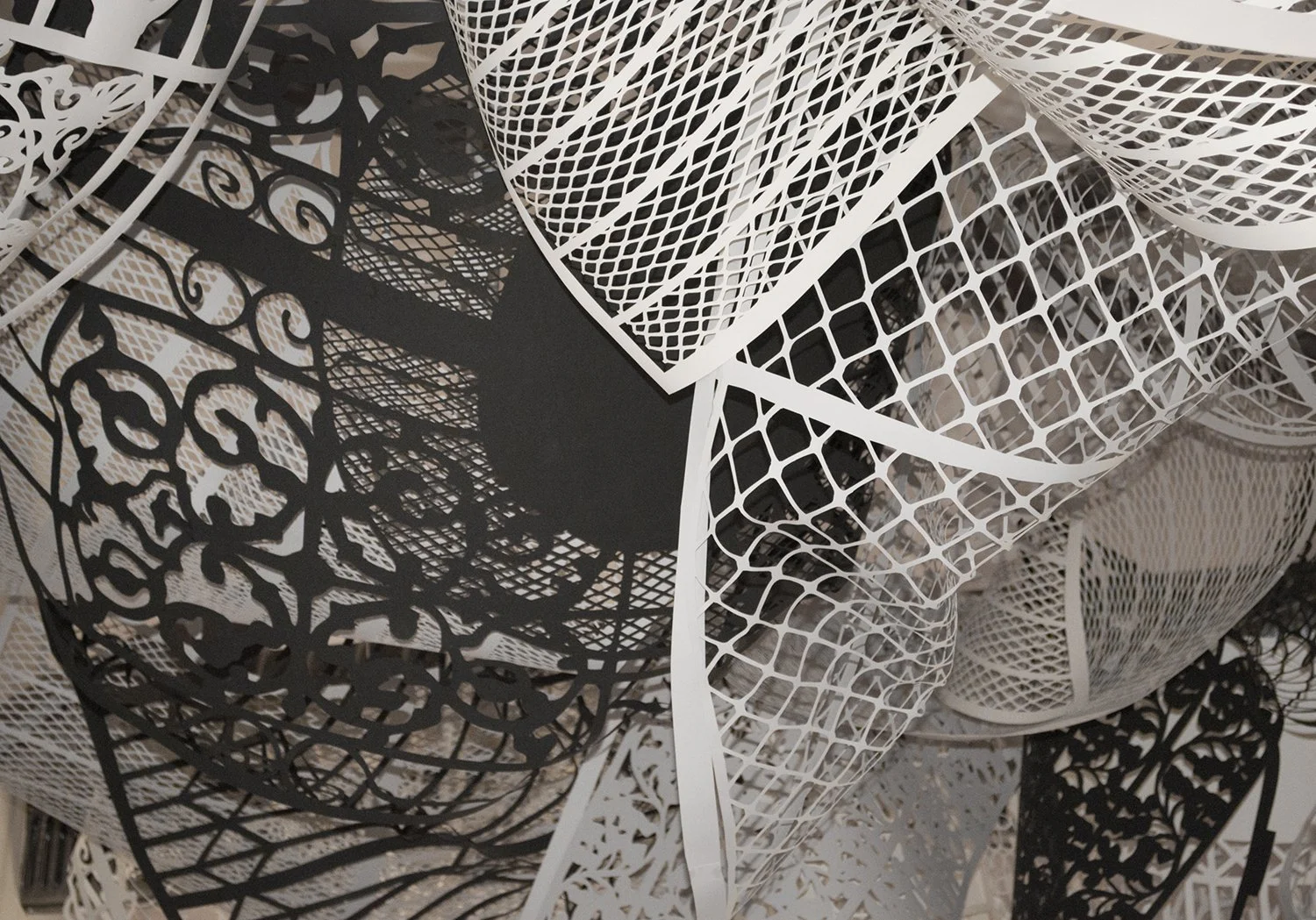 Commonwealth (detail), installed and reconfigured 2015, 2017, 2022, handcut paper