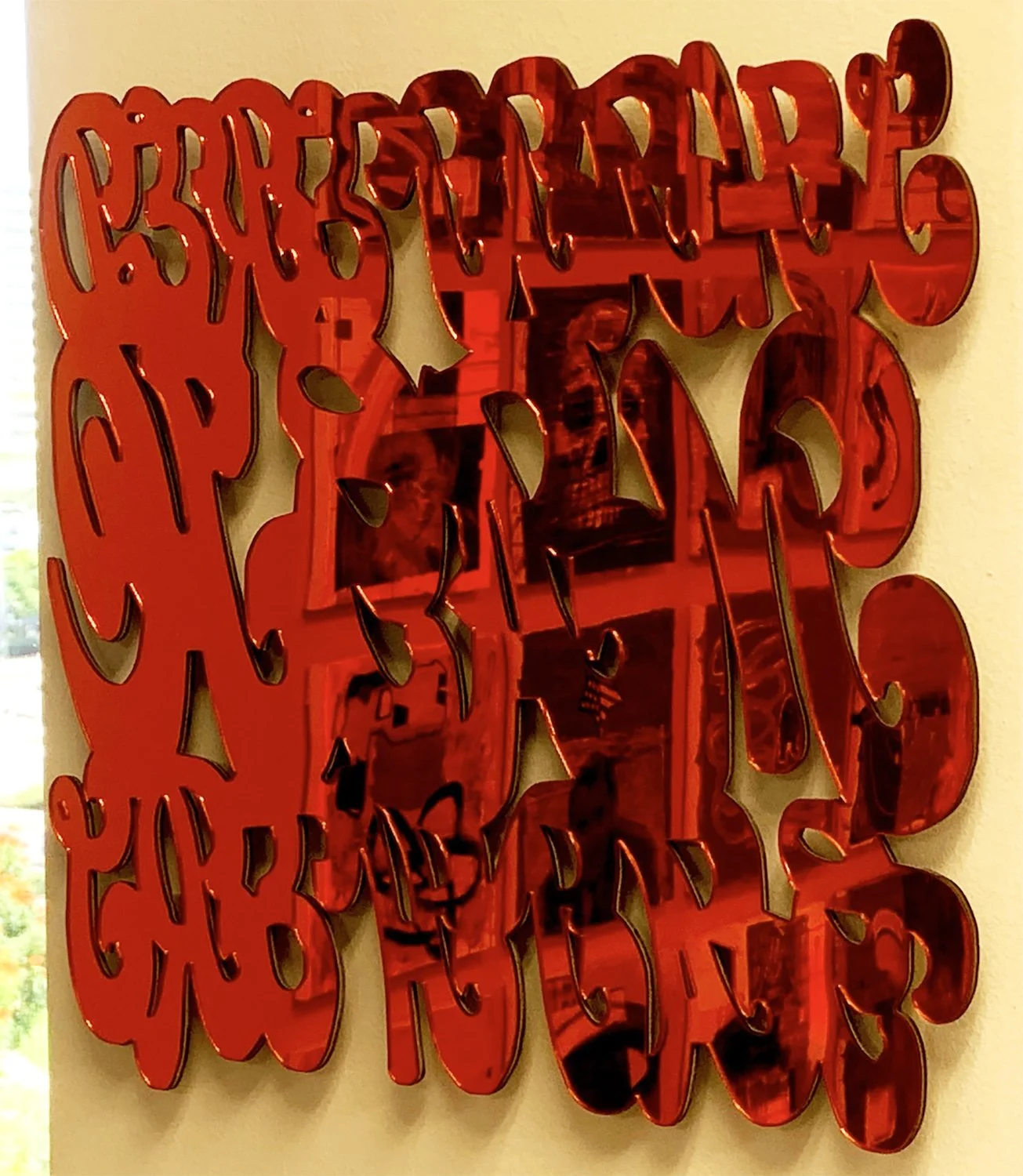    Peace Frog (Shattered Magic Gathers),   2024, laser-cut acrylic mirror, 19 x 18 inches 