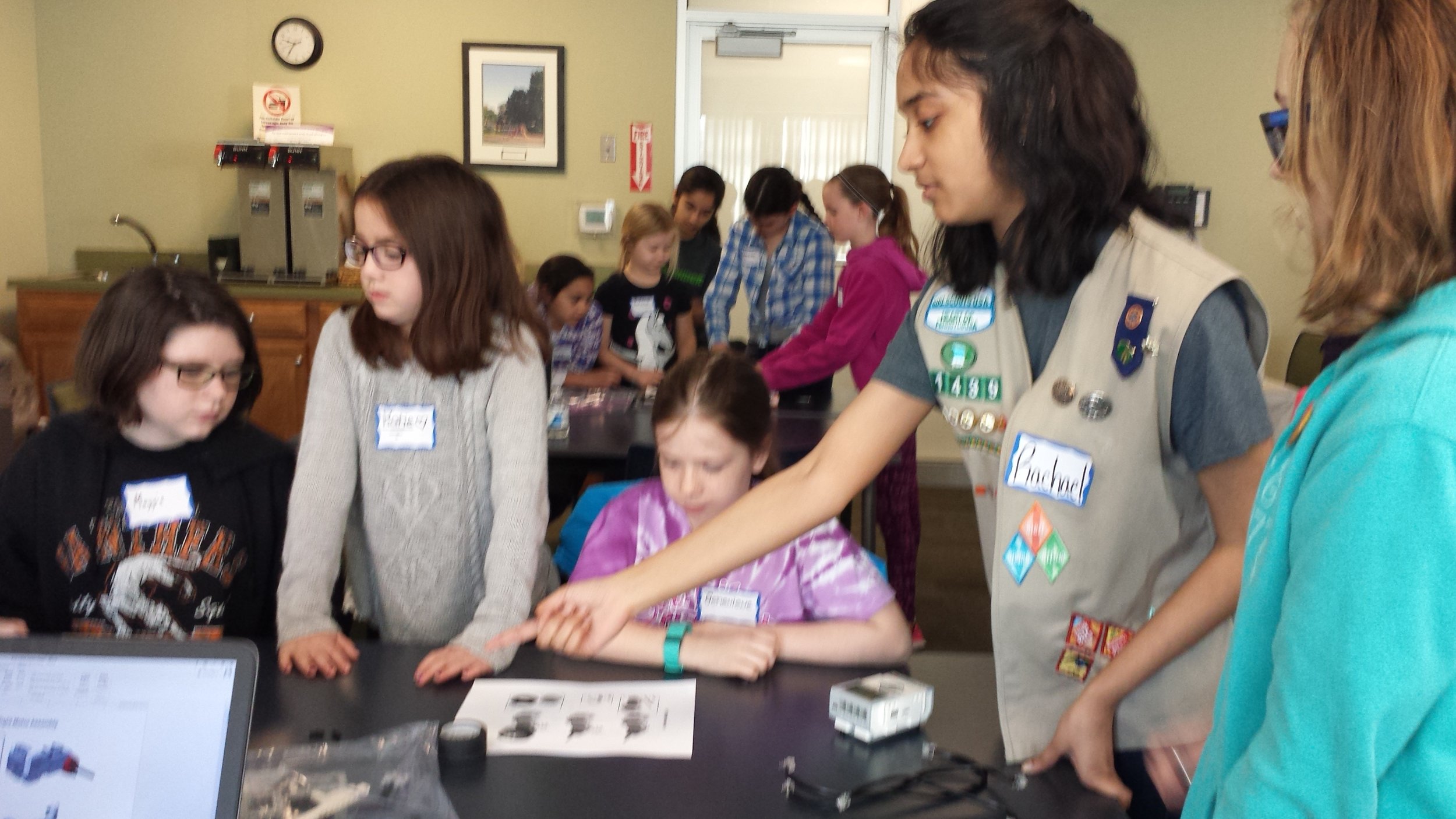  Rachael guides the participants in building their robot.&nbsp;Girls Robotics Camp, March 2017. 