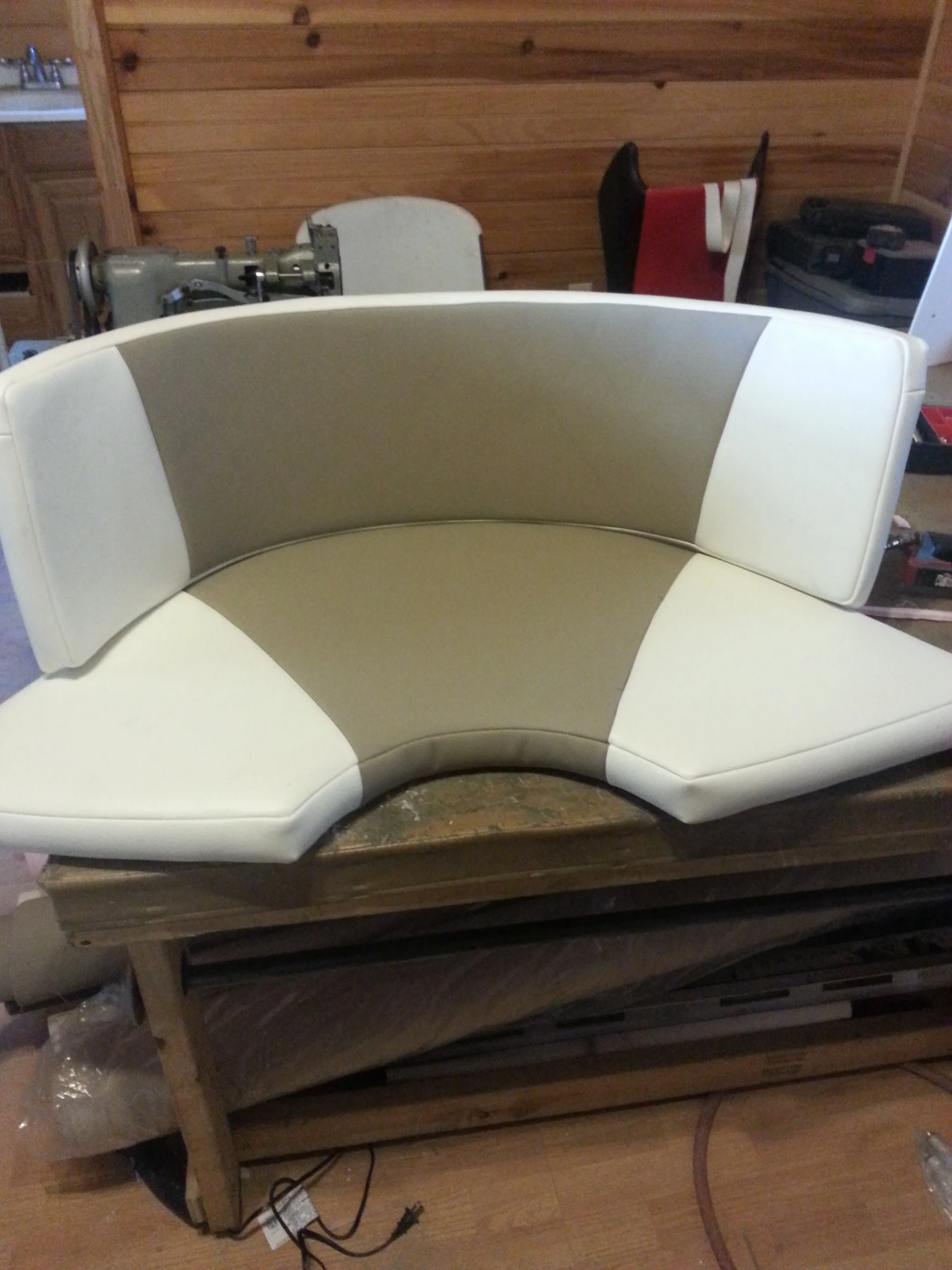Custom marine interior provided by https://www.sunbrella.com/en-us/, diamond tucked seats, custom auto and marine upholstery and interior in michigan, ohio, canada Vinyl sewing design jet ski interior, wave runner interior and canvas bimini top