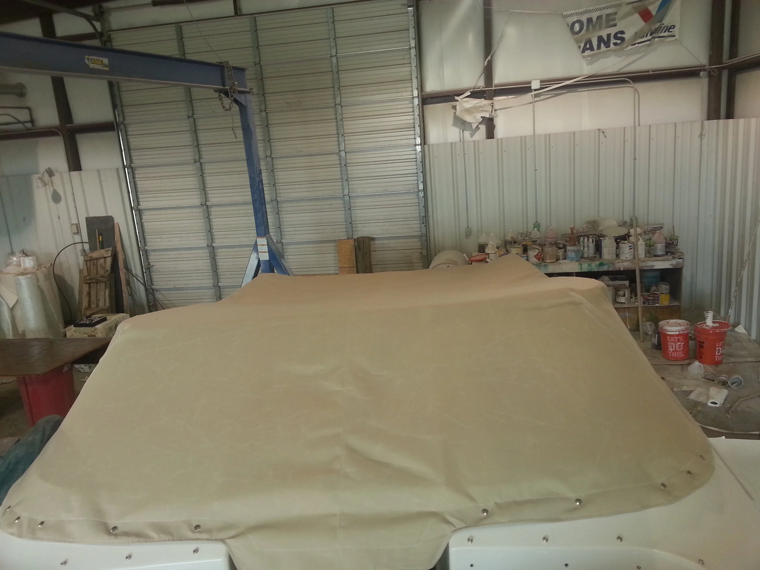 Custom marine interior provided by https://www.sunbrella.com/en-us/, diamond tucked seats, custom auto and marine upholstery and interior in michigan, ohio, canada Vinyl sewing design jet ski interior, wave runner interior and canvas bimini top
