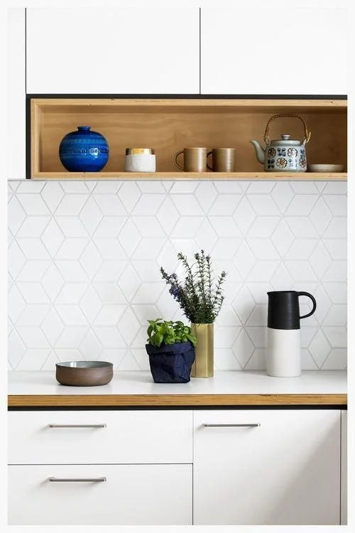 3D cube geometric tiles in white. Kitchen designed and made by Cantilever Interiors