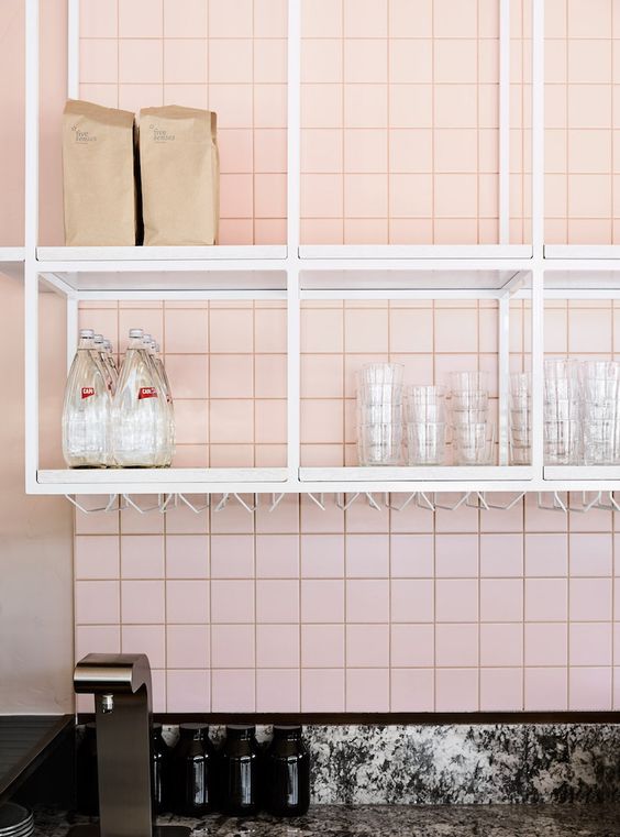 Tuscan pink tiles feature in this stylish Melbourne cafe. Interior Design: Golden