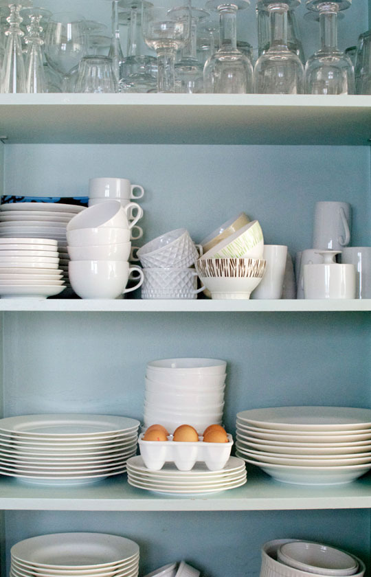 Duck egg blue with white china looks perfect in this London home pantry. Apartment Therapy