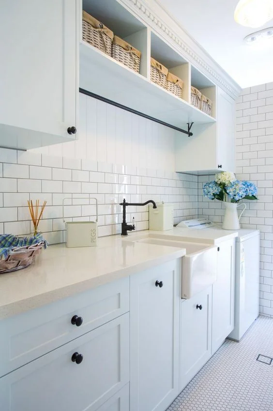 The black hanging rail matches the door knobs and tapware. | Makings of Fine Kitchens & Bathrooms