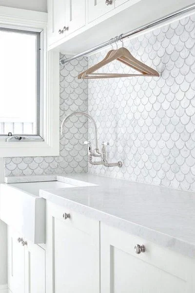 Aren’t these scalloped fish scale tiles lovely? A tall hanging space above the bench is an opportunity to feature some impressive tiles. | Provincial Kitchens