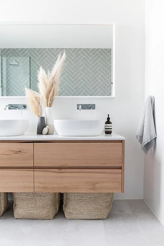 Solid Tasmanian Oak vanity unit from Loughlin Furniture , top mount basins with chrome wall taps. | stylist Catherine Heraghty & builder Neil Hipwell for realestate.com.au 2 in Twelve project.