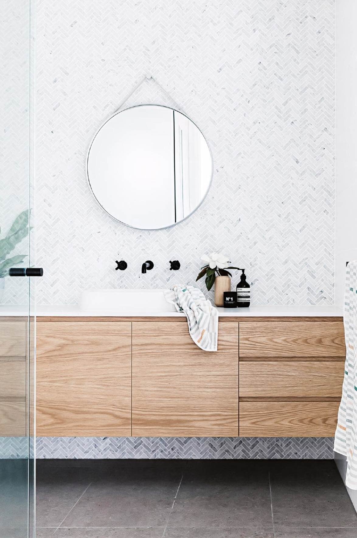 Floating timber vanity with stunning herringbone calacatta marble tiles | architect: Design Tribe Projects | tiles: Surface Gallery | joinery: Competitive Joinery | stylist: Kerrie-Ann Jones | Photographer: Maree Homer