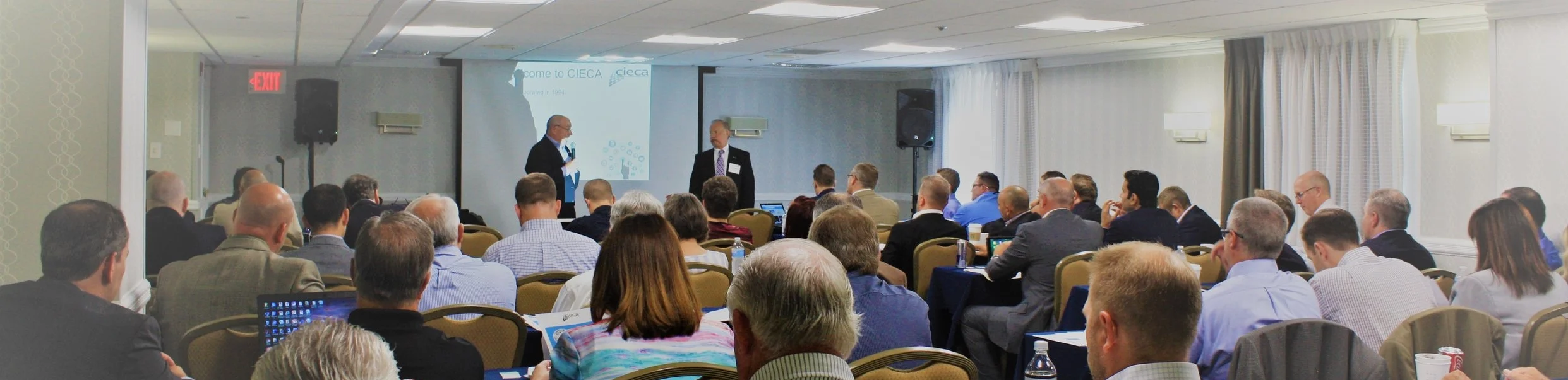 CIECA representatives Charley Quirt and Fred Iantorno present information about data standards to PIRC in July 2018, Chicago, Ill.