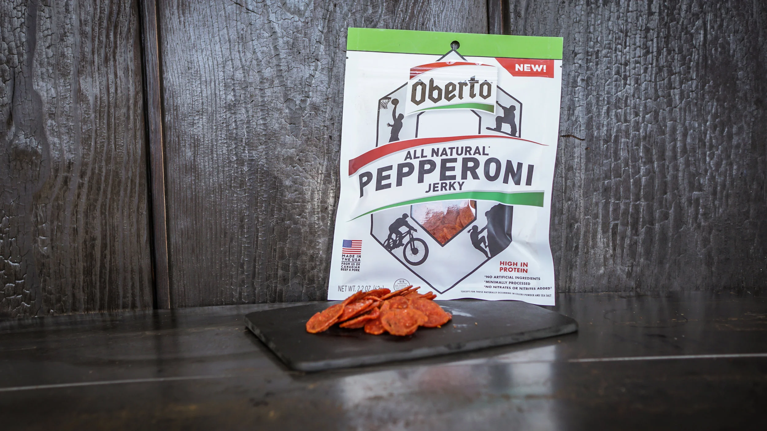 A bag of Pepperoni Jerky resting on a cutting board