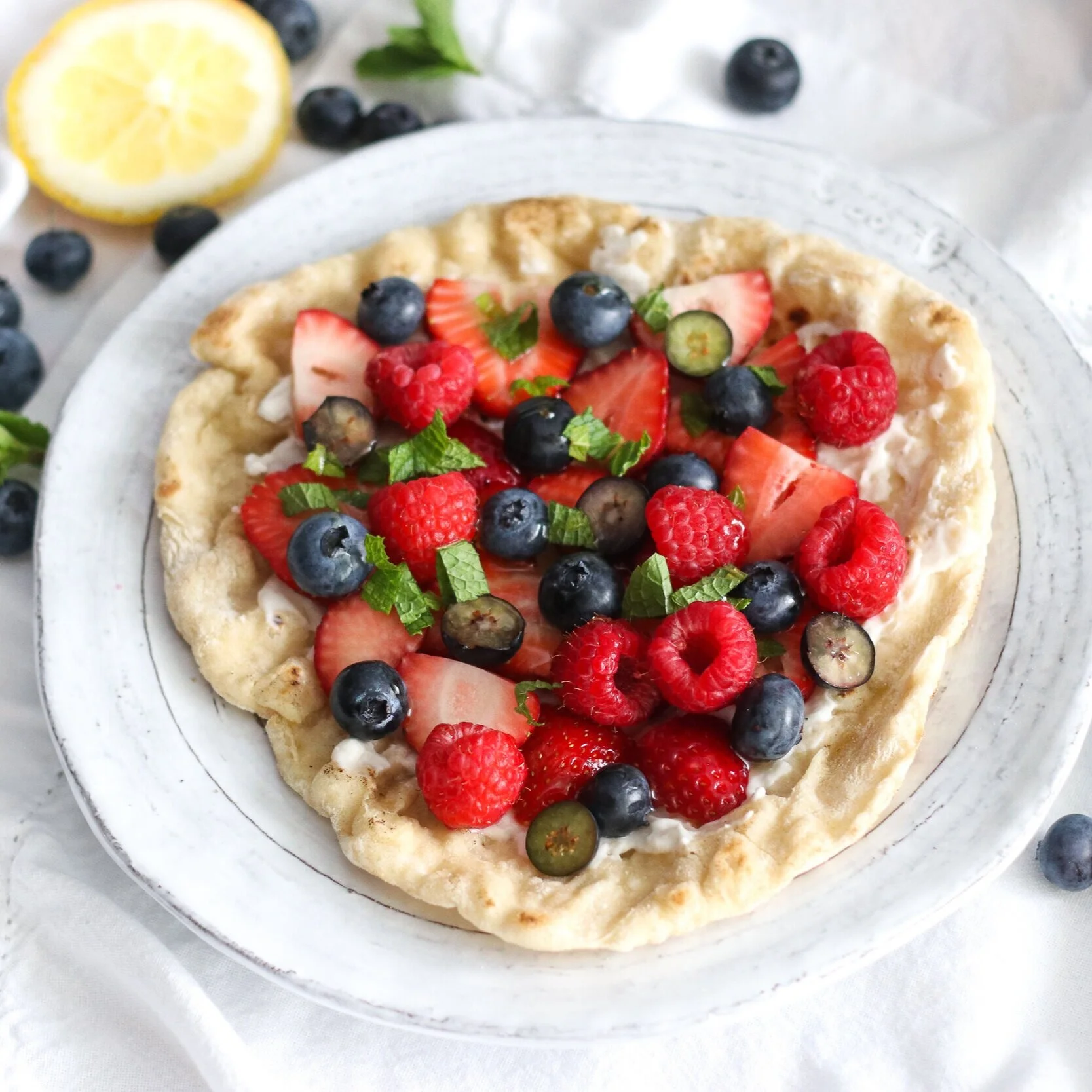 flatbread+with+berries+and+lemon+coconut+cream.jpg