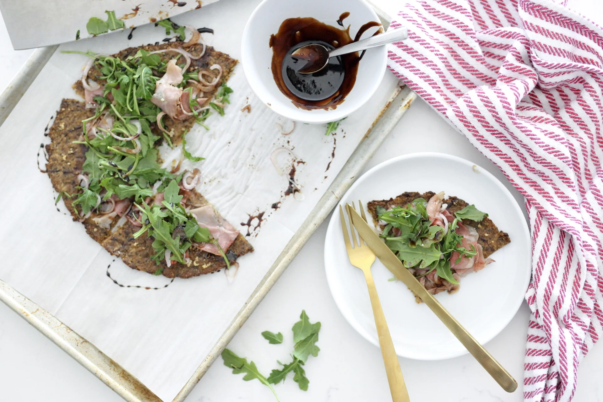 Paleo Prosciutto and Arugula pizza