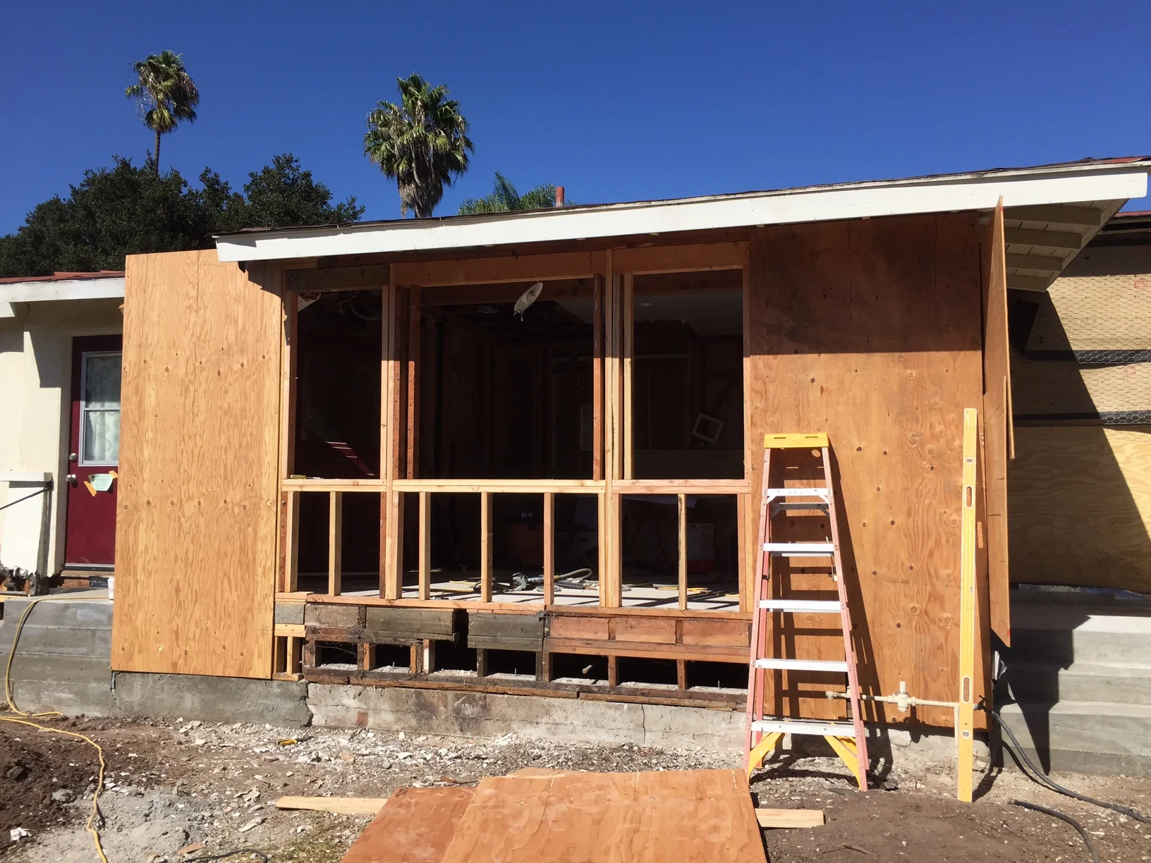  Window rough openings almost completed. &nbsp;The four foot wide plywood panels on either side of the windows are for lateral shear. 