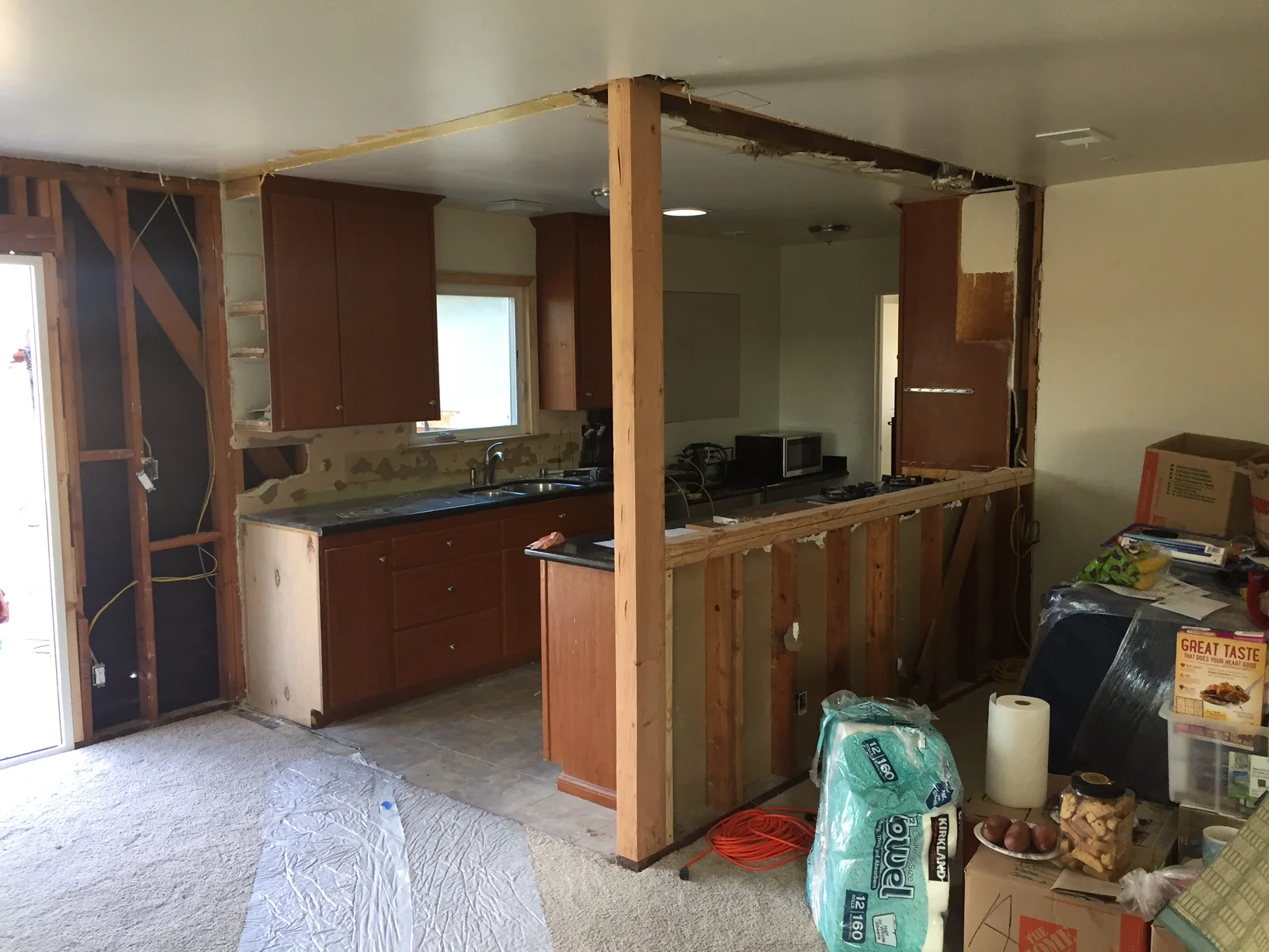  Existing kitchen cabinets undergoing demotion. 