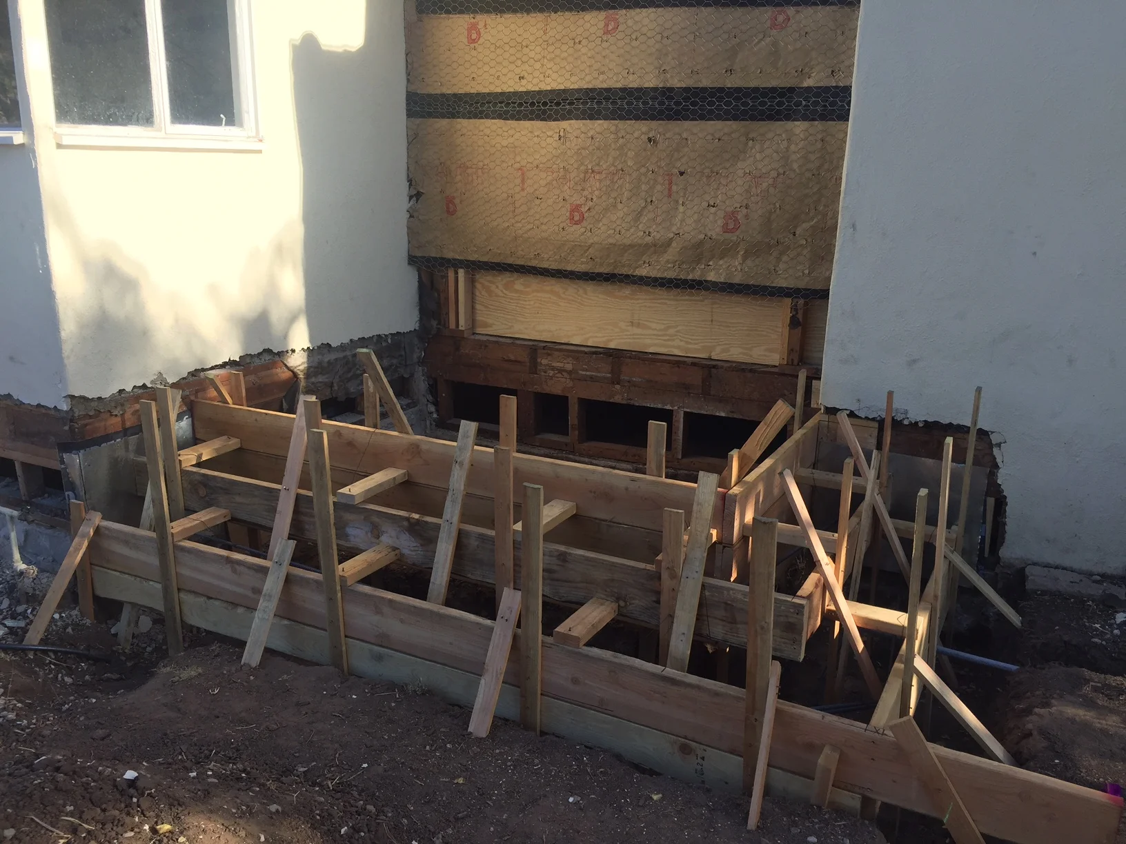  Formwork for new steps connecting the dining room to what will be a new patio space. 