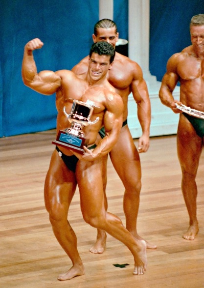 Winning pose with trophy at the 1989 NABBA Mr. Australia