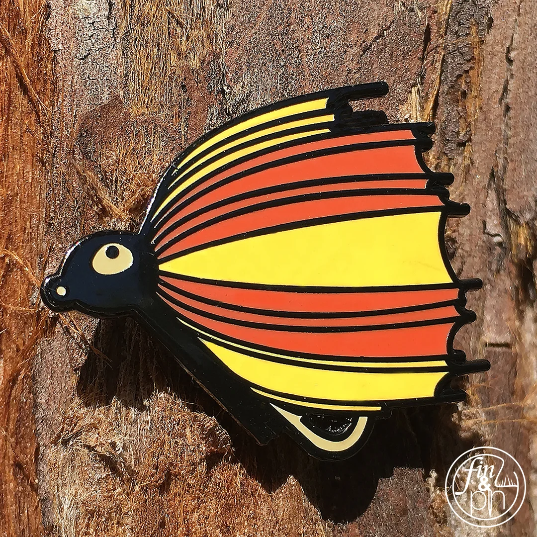 Jig on a tree bark hat pin
