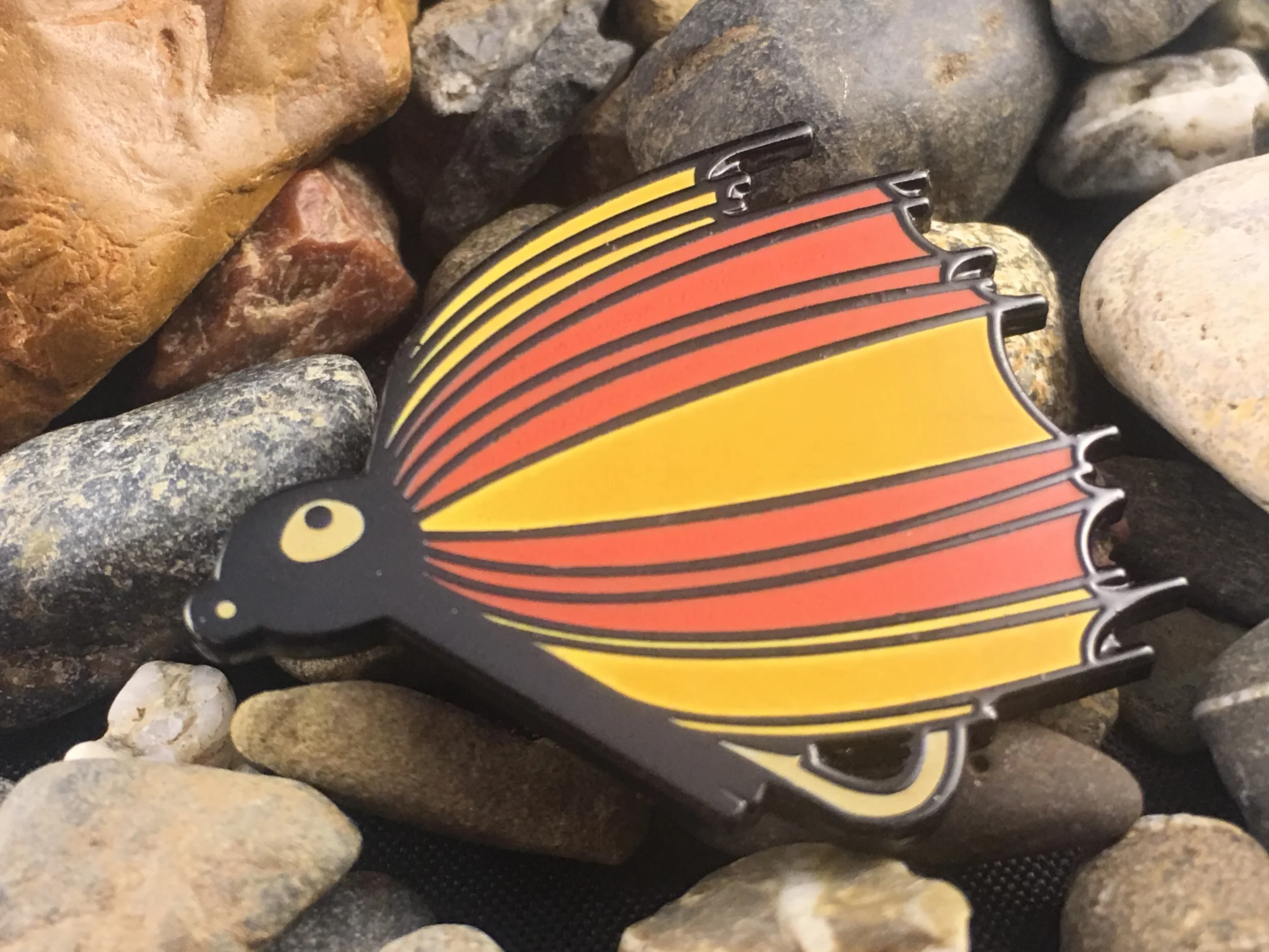 Fin & Pin - Jig on the stream rocks