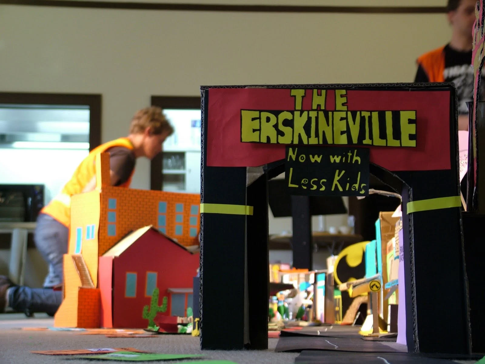  Applespiel construct a (more or less) to scale model of your local area, out of coloured cardboard, paddepop sticks and pipe cleaners. Over several days through surveying the public, Applespiel identify potential eyesores, note down wild architectur