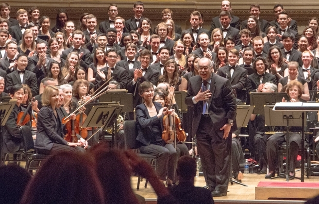  In April of 2015, The Glee Club and Chorus had the honor of singing the world premiere of Roberto Sierra's 'Cantares' in Carnegie Hall. Here is Roberto receiving a standing ovation from the audience. 