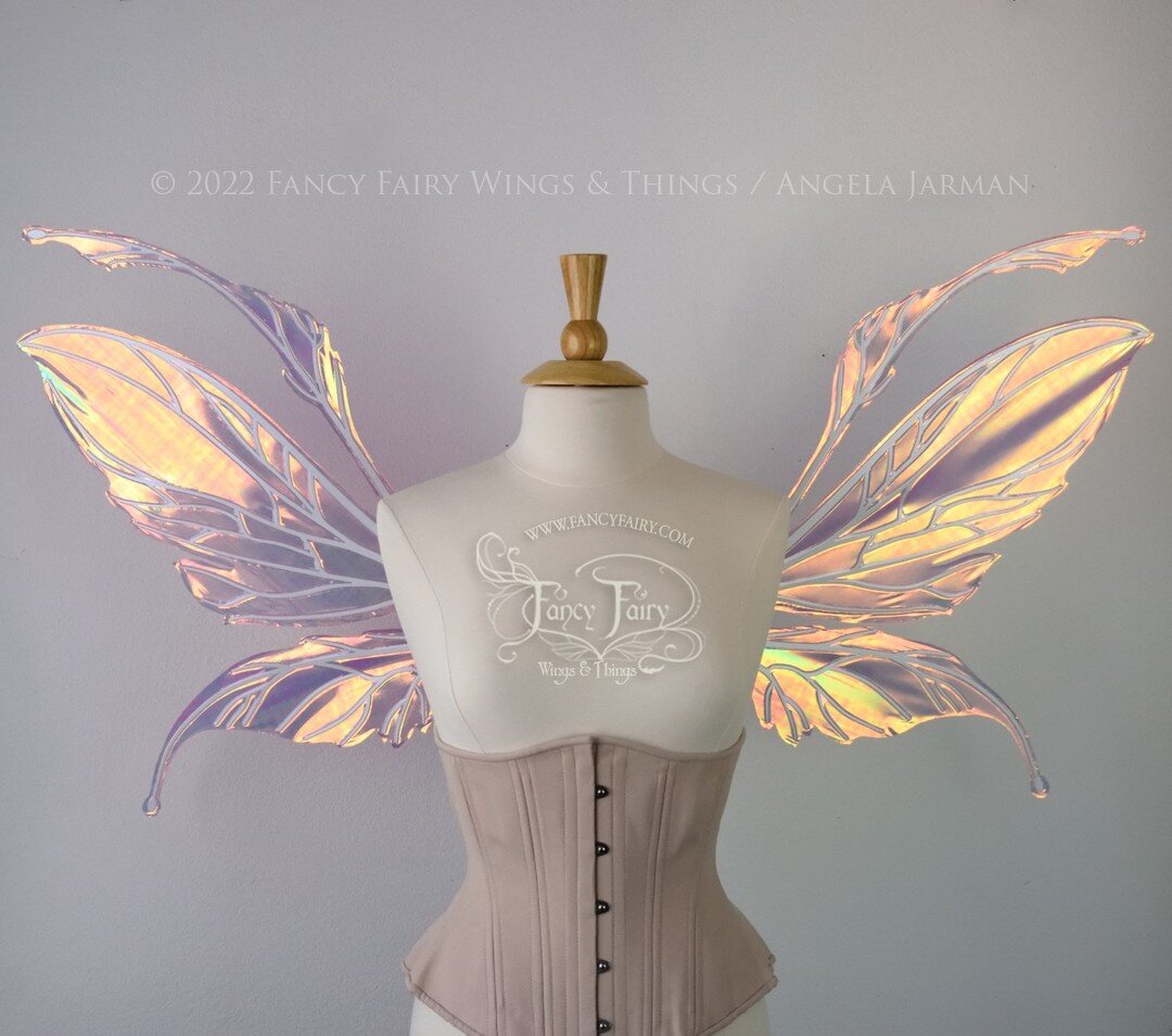 I hope these fairy wings can brighten up a dreary week.
This is the Datura design in Spiked Punch with white veining, and also in Ultraviolet with black veins.
More info in my by-oh link and Stories