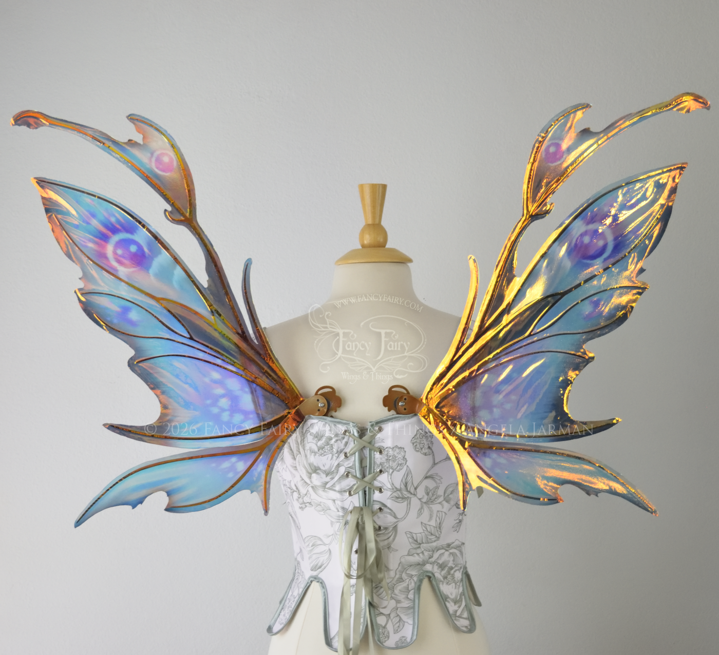 Iridescent fairy wings with a spikey profile &amp; antennae, painted in shades of teal and purple, back view 