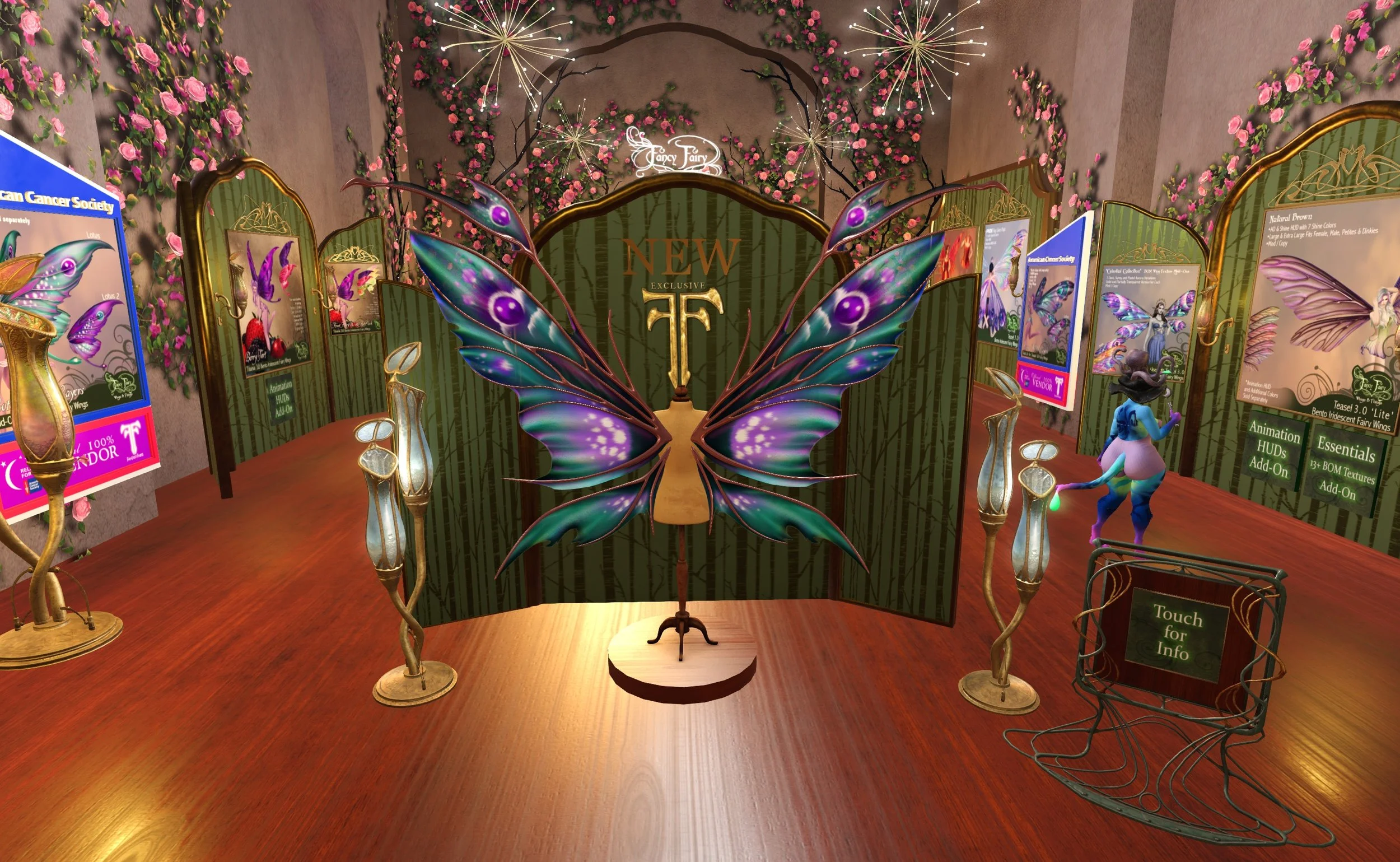 Second Life photo of the interior of my fairy wing store, featuring a dress form in the center with a set of teal and purple iridescent wings displayed on it with a green display screen behind it. There are pink climbing roses on the walls