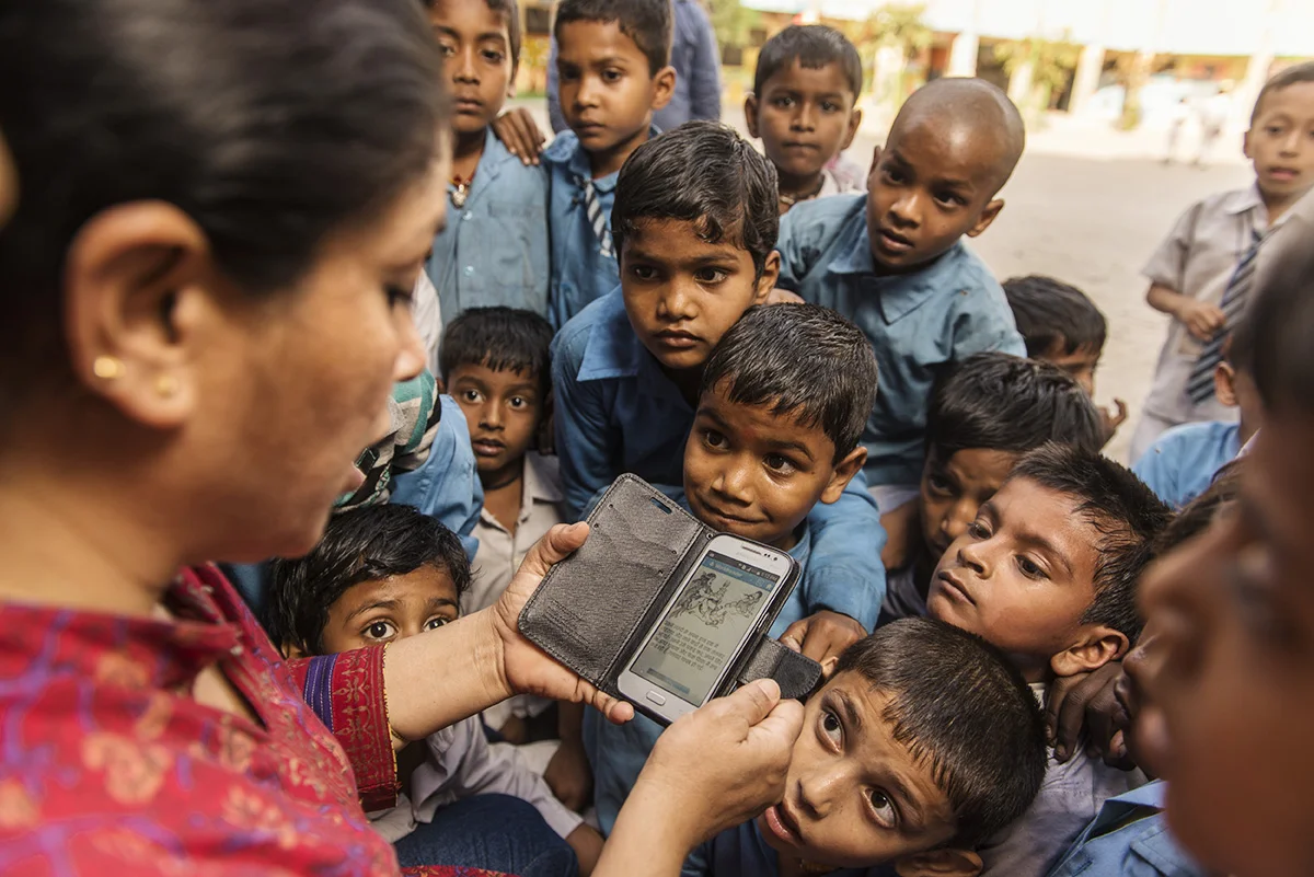 Children listening to a story. Credit: Worldreader